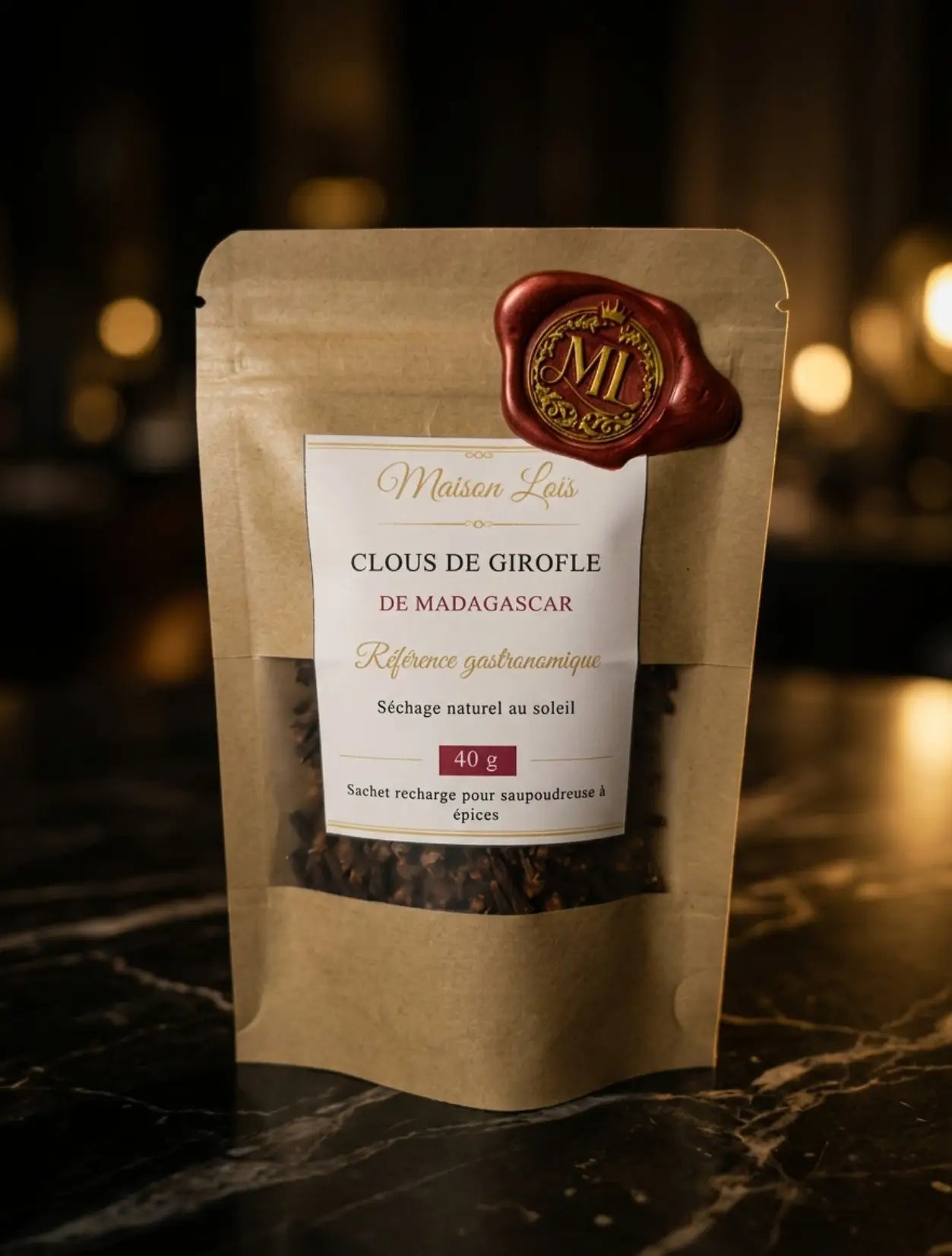 Clous de girofle de Madagascar en sachet recharge 40 g pour saupoudreuse à épices, sélection Maison Loïs Genève.