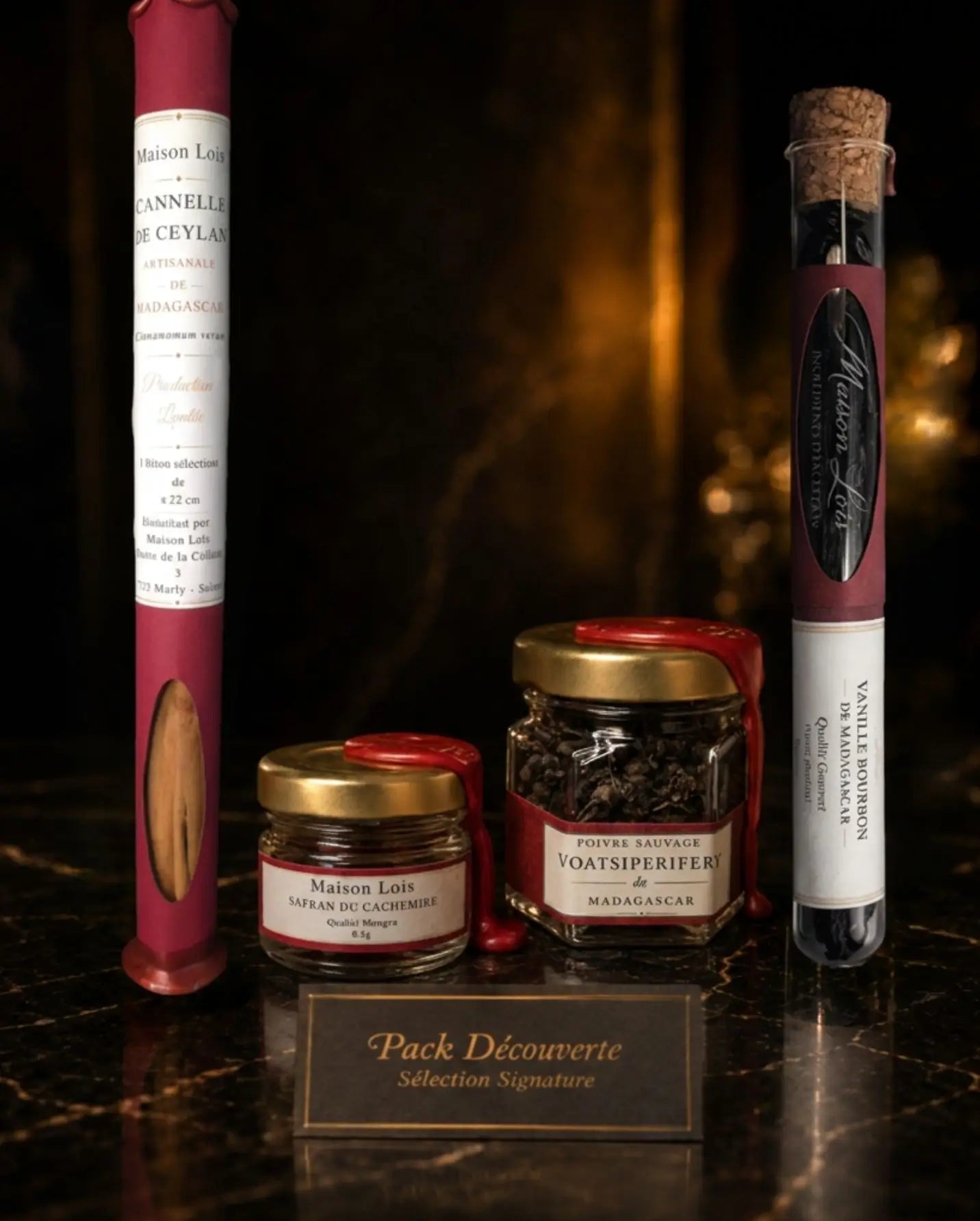 Pack Découverte Sélection Signature Maison Loïs, assortiment d’épices rares en présentation luxe sur marbre noir.