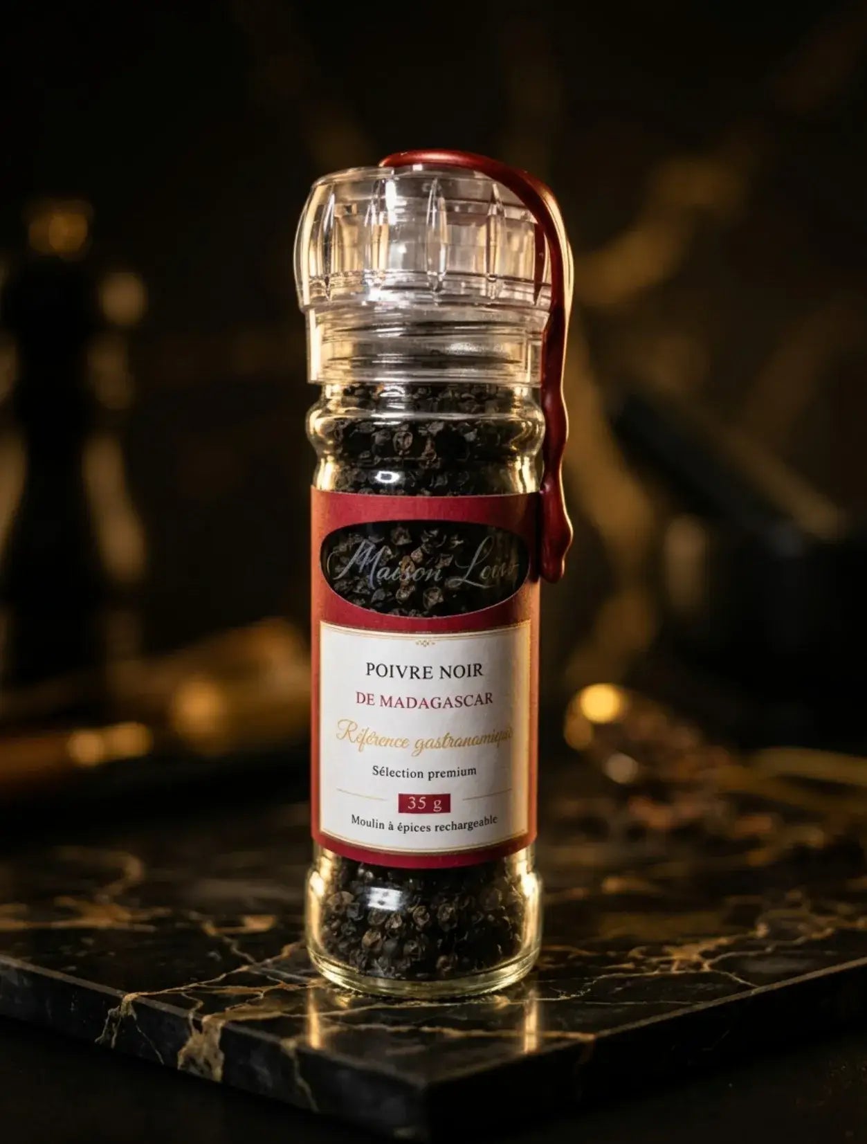 Poivre noir de Madagascar en poivrière rechargeable Maison Loïs Suisse, sélectionné auprès de petits producteurs.